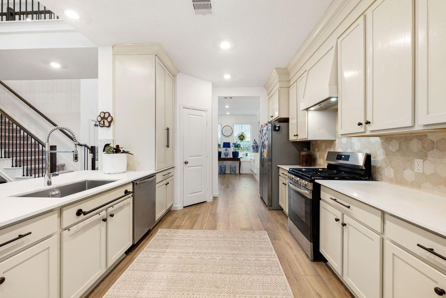 Furnished interior view inside a new home in ARTAVIA: Fairway Collection, Conroe (Image 6).