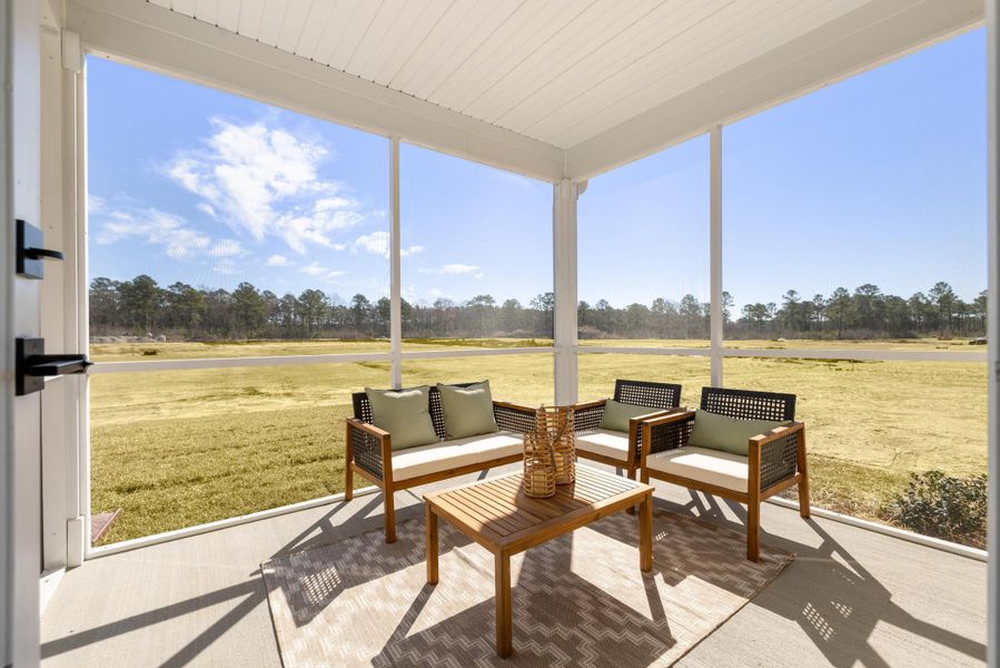 Exterior details and patio area of a home in The Oaks, Goose Creek (Image 4).