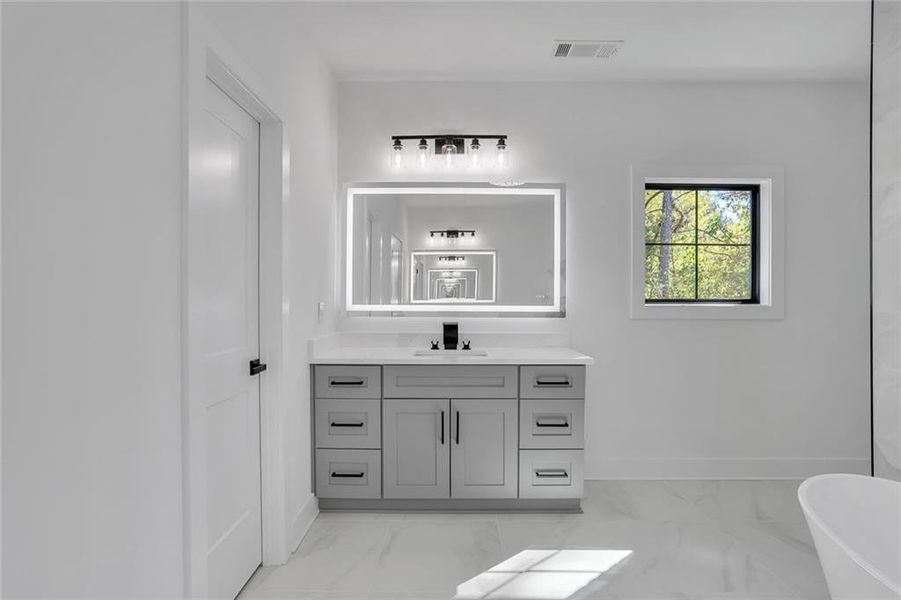 Furnished interior view inside a new home in , Loganville (Image 5).