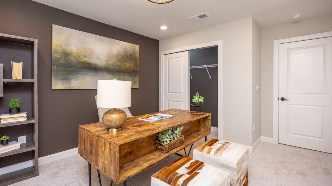 Furnished interior view inside a new home in The Courtyards at Oak Grove, Durham (Image 31).