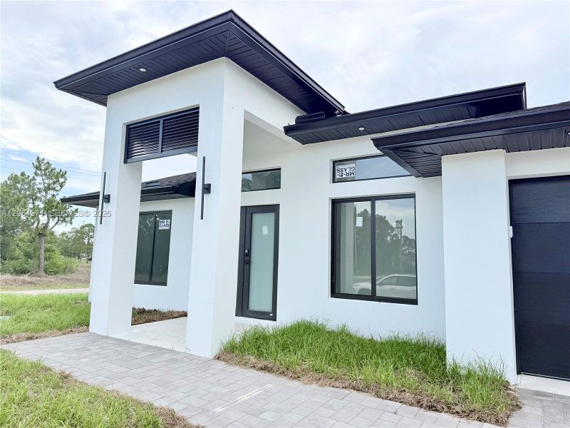 Exterior details and patio area of a home in , Lehigh Acres (Image 25).