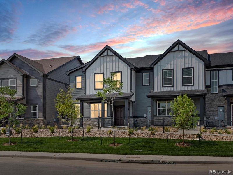 Front exterior of a new home in Poudre Heights: The Meadow Collection, Windsor, CO, highlighting curb appeal (Image 13). Front exterior of a new home in Poudre Heights: The Meadow Collection, Windsor, CO, highlighting curb appeal (Image 13).