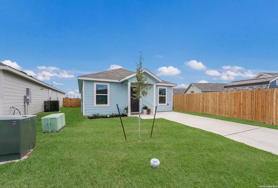 Exterior details and patio area of a home in Spring Grove, Converse (Image 22).