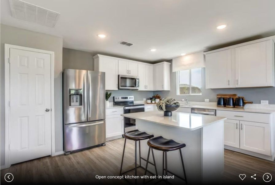 Interior photos- Photo of Pulte model home with same floor plan, not of actual home listed.