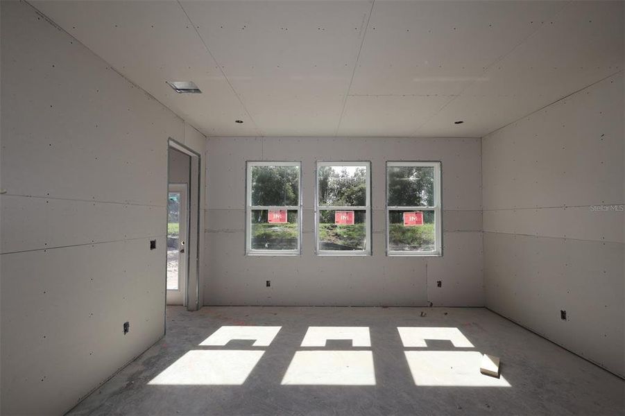 In-progress construction of a new home in Eden at Crossprairie, St. Cloud, FL (Image 5).