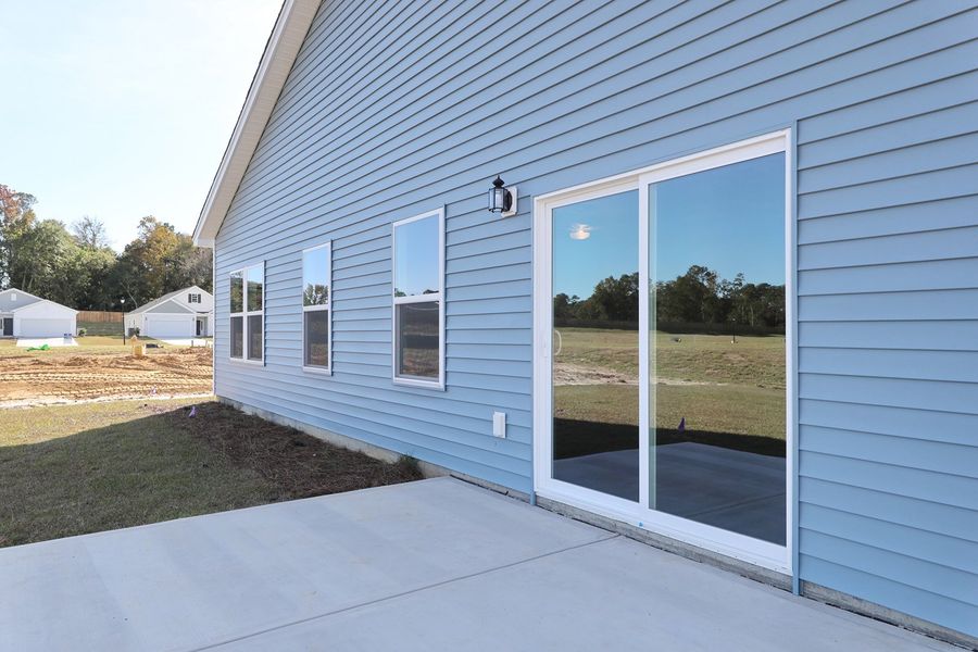 Exterior details and patio area of a home in Jordan Grove, Conway (Image 2). Exterior details and patio area of a home in Jordan Grove, Conway (Image 2).