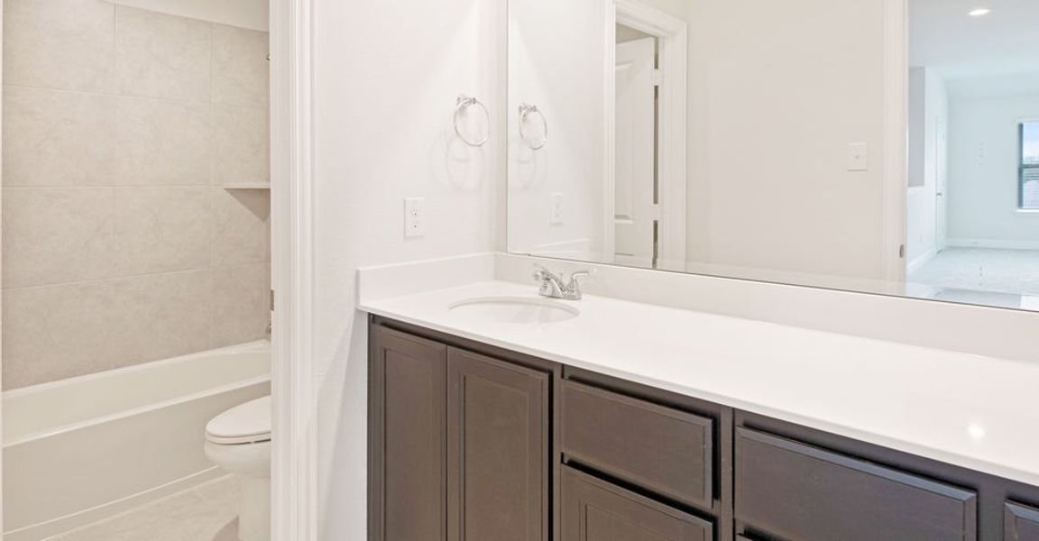 Representative exterior photo of a completed home built from the Stirling by Impression Homes in Timberbrook, Justin, TX (Image 21). Representative exterior photo of a completed home built from the Stirling by Impression Homes in Timberbrook, Justin, TX (Image 21).