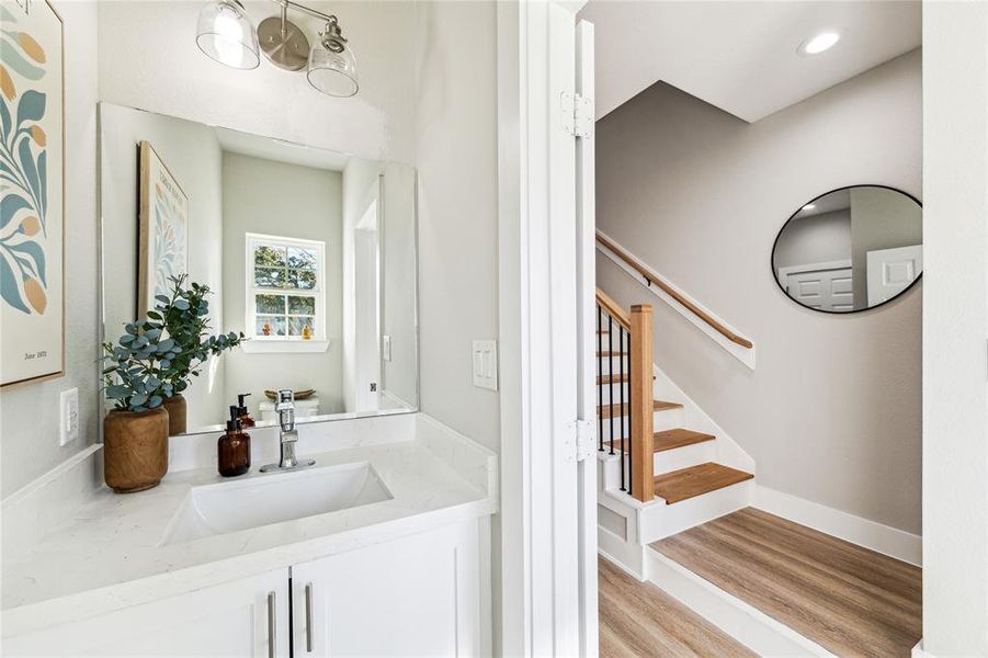 The powder room located at the front entry of the home.