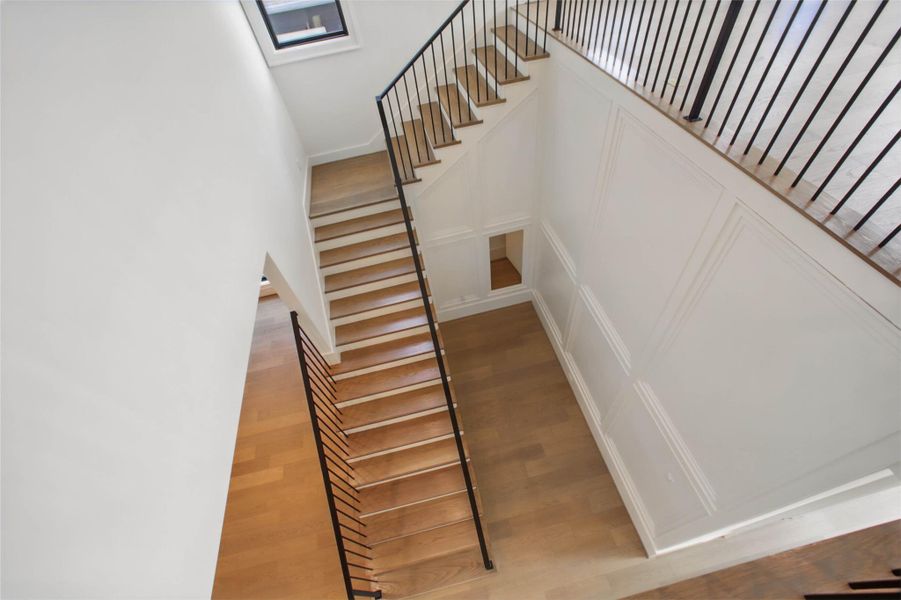 Sample of builder's previous construction. View of staircase.  This home will have similar layout/floor plan as pictured here.