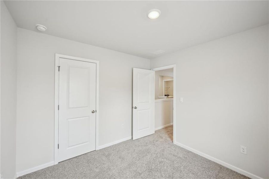 Spacious, unfurnished interior of a new home in Hawthorne Station, College Park (Image 21).