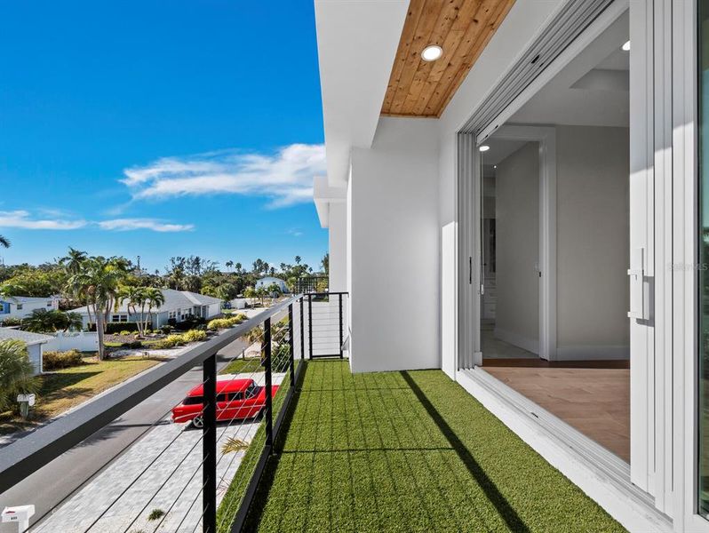 Exterior details and patio area of a home in , Longboat Key (Image 25).