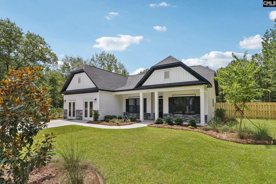 Front exterior of a new home in Raglins Creek, Lugoff, SC, highlighting curb appeal (Image 20).
