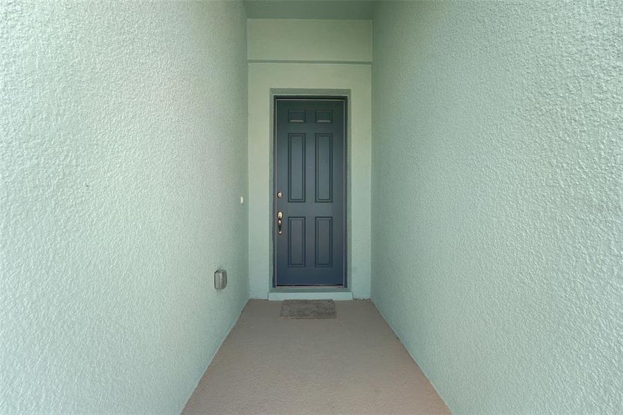 Exterior details and patio area of a home in Annabelle Estates, Winter Haven (Image 1).
