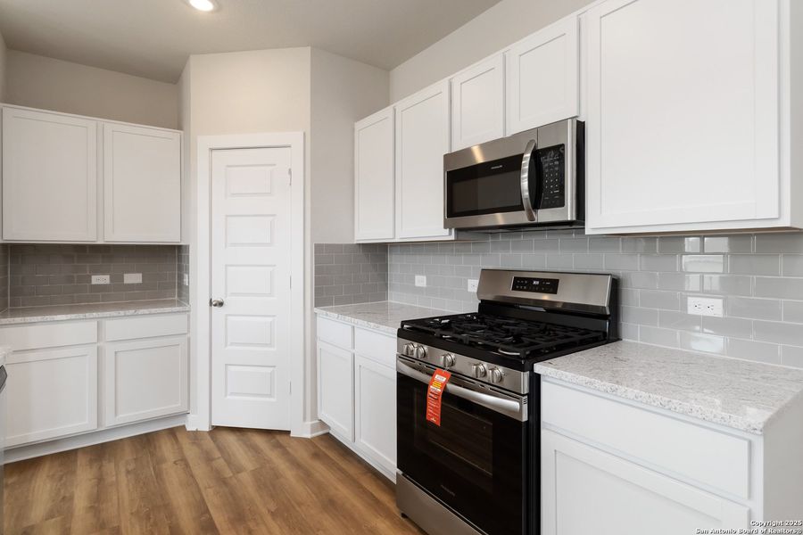 Furnished interior view inside a new home in Hickory Ridge, Elmendorf (Image 3).