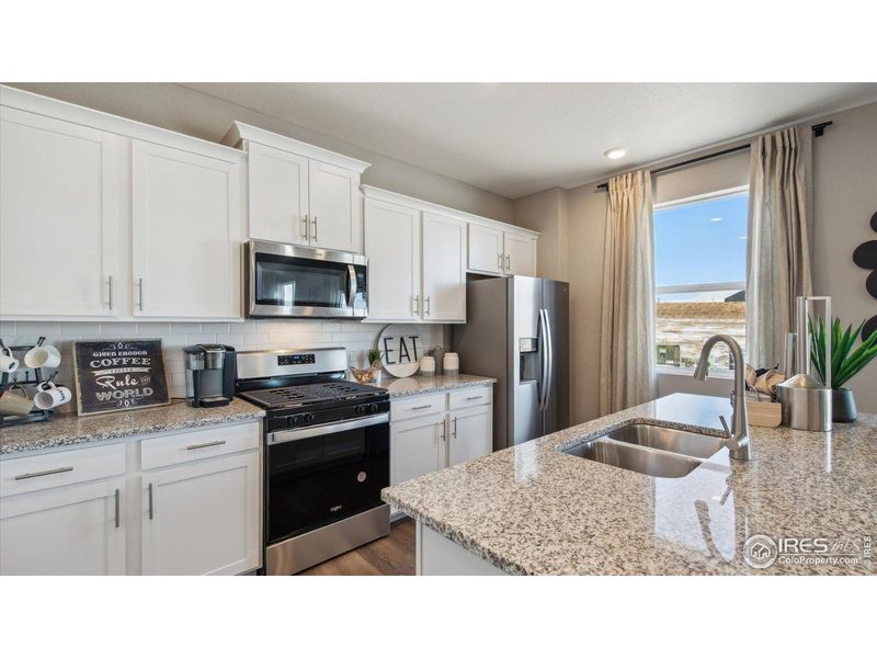 Furnished interior view inside a new home in Vista Meadows, Fort Lupton (Image 5).