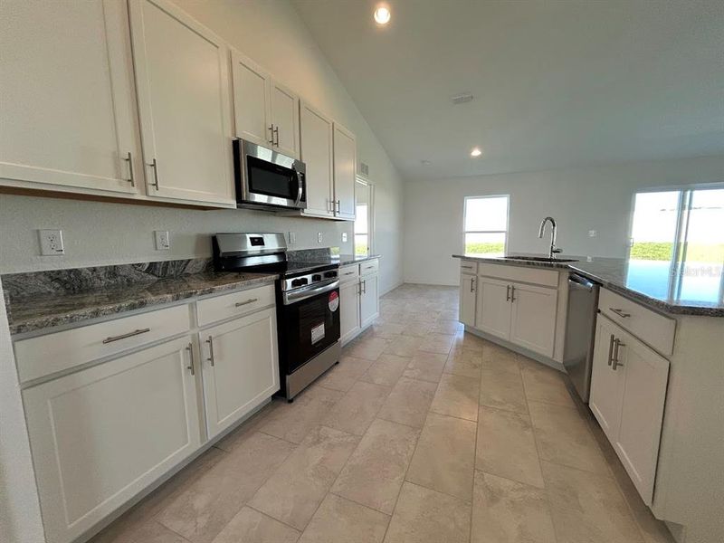 Furnished interior in a model home at James Farms in Bartow (Image 3).