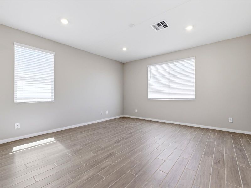 Spacious, unfurnished interior of a new home in White Tank Foothills Reserve Series, Waddell (Image 14). Spacious, unfurnished interior of a new home in White Tank Foothills Reserve Series, Waddell (Image 14).