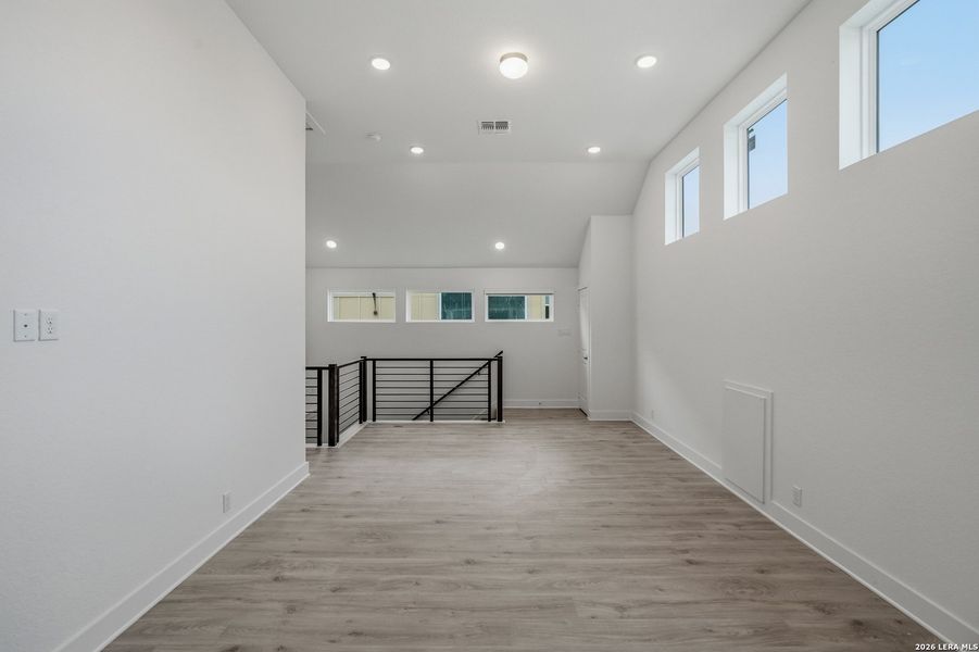 Spacious, unfurnished interior of a new home in Prominence, San Antonio (Image 31).