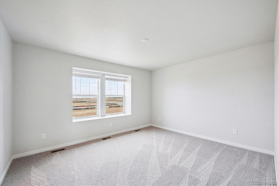 Spacious, unfurnished interior of a new home in Legato, Commerce City (Image 13).