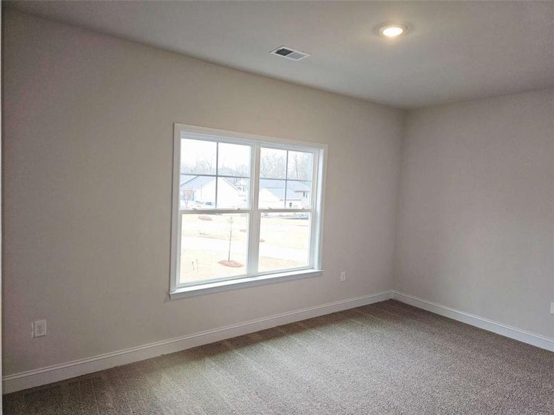 Spacious, unfurnished interior of a new home in Scarlett Place, Bowdon (Image 10).