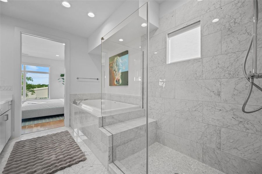Contemporary bathroom featuring a glass-enclosed shower with stone tile walls, a built-in tub with stone surround, and recessed lighting
