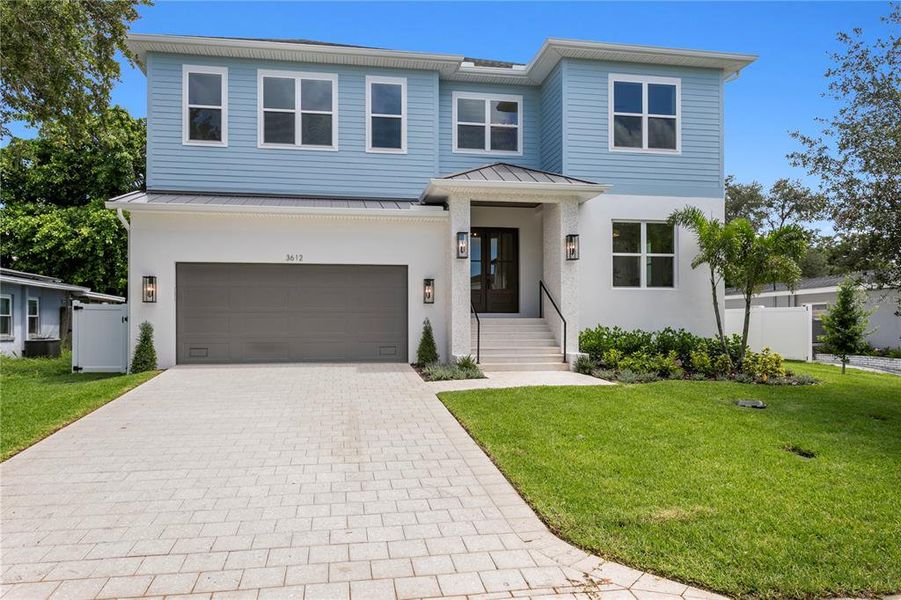 Front exterior of a new home in , Tampa, FL, highlighting curb appeal (Image 31).