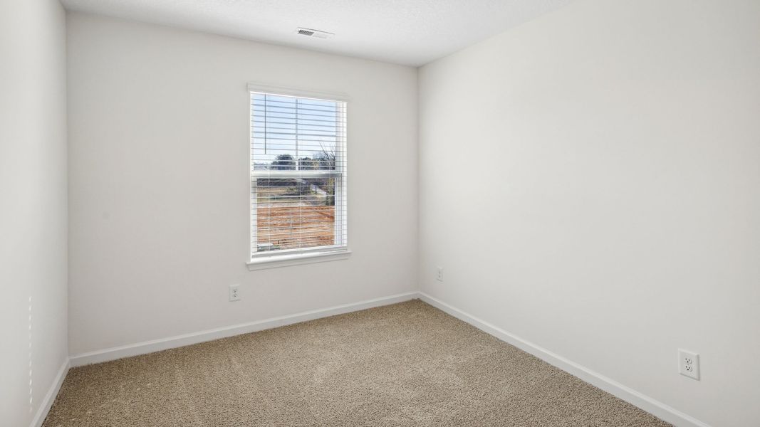 Spacious, unfurnished interior of a new home in The Hideaway at Fox Meadows, Bluff City (Image 23).