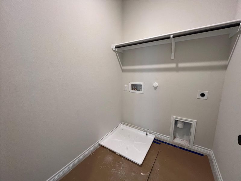 In-progress construction of a new home in The Homestead at Lariat, Liberty Hill, TX (Image 18).