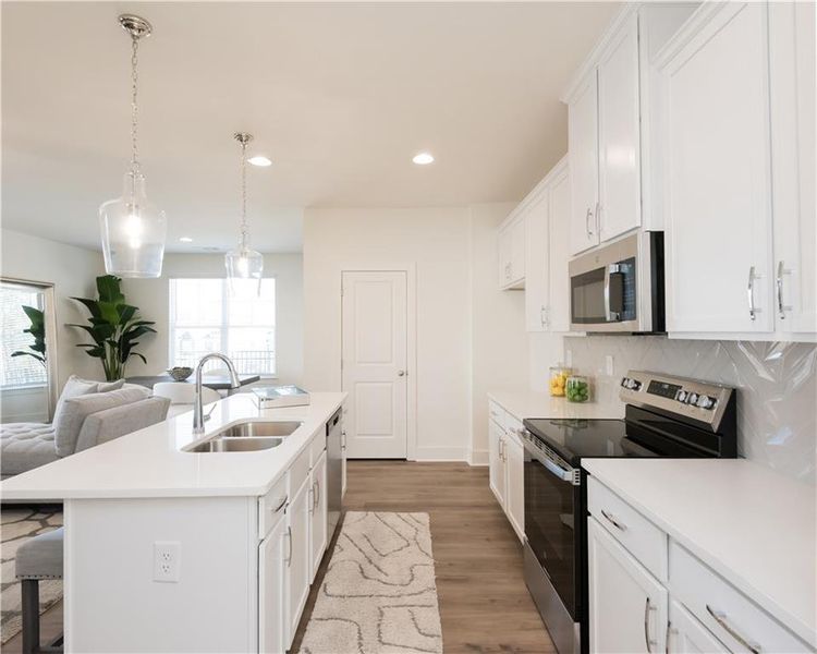 Furnished interior view inside a new home in Tribute, Hoschton (Image 3).
