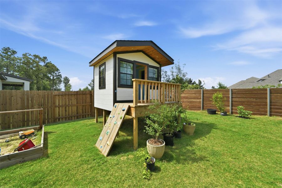 Insulated Play house can stay or be removed. It had electricity to it