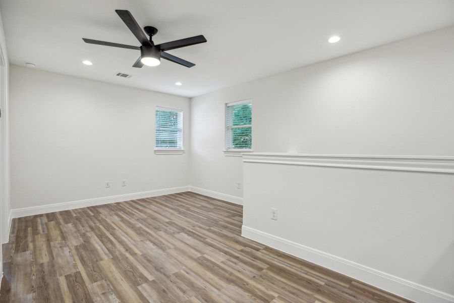 Upstairs Family room with baseboards, visible vents, recessed lighting, a ceiling fan, and vinyl wood plank floors