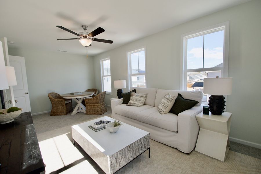 Representative furnished interior of a home built from the Madison by Stevens Fine Homes in Parkwood Estates, Leland (Image 7).