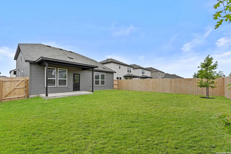 Exterior details and patio area of a home in Dove Song, Marion (Image 3).