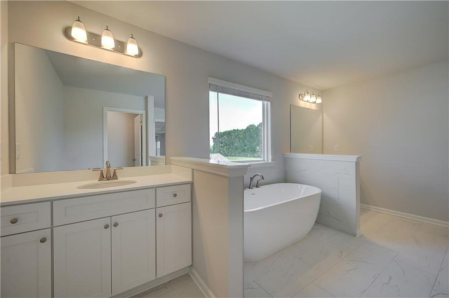 Furnished interior view inside a new home in Northcroft, Loganville (Image 5).
