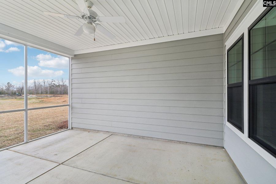 Exterior details and patio area of a home in Collins Cove, Chapin (Image 2). Exterior details and patio area of a home in Collins Cove, Chapin (Image 2).