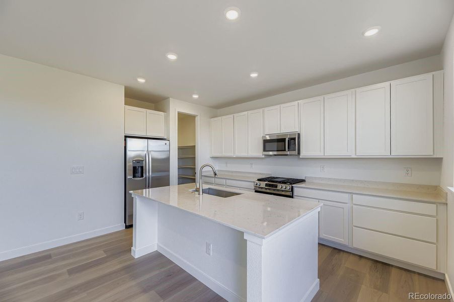 Furnished interior view inside a new home in Vermilion Creek: The Pioneer Collection, Centennial (Image 7).