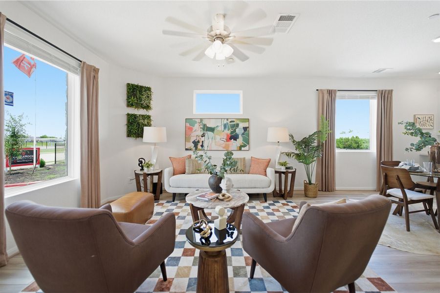 Representative furnished interior of a home built from the Kahn by CastleRock Communities in Municipal Drive Townhomes, Leander (Image 4).
