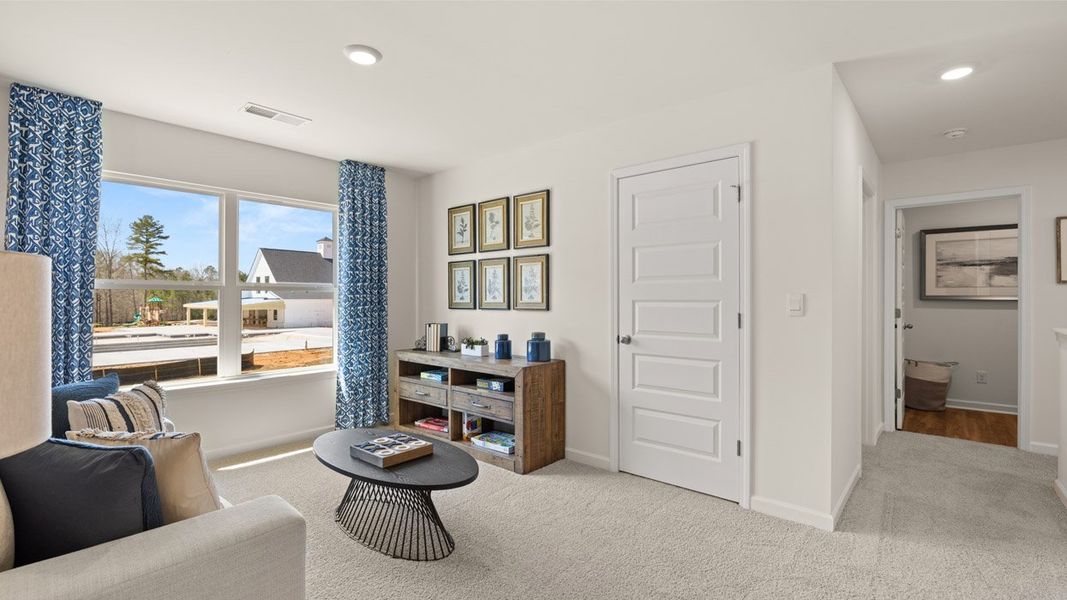Representative furnished interior of a home built from the HAYDEN Express by D.R. Horton in WillowBrook, Winder (Image 52).