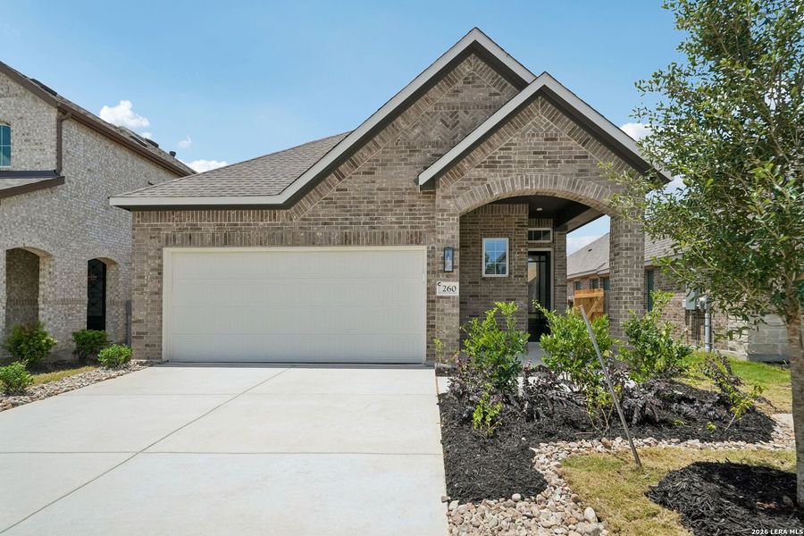 Front exterior of a new home in Legacy at Lake Dunlap, New Braunfels, TX, highlighting curb appeal (Image 1). Front exterior of a new home in Legacy at Lake Dunlap, New Braunfels, TX, highlighting curb appeal (Image 1).