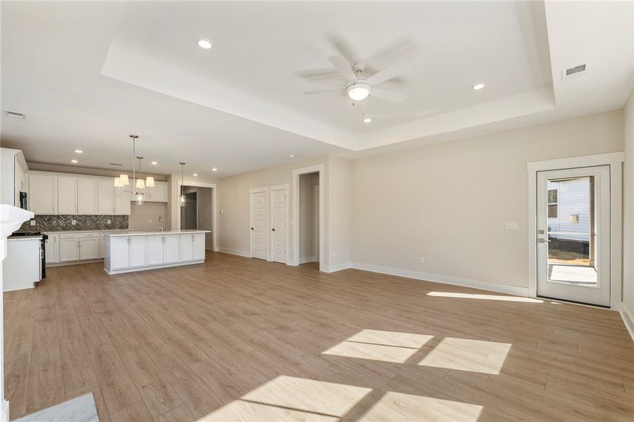 Bright, open concept living and kitchen area featu Bright, open concept living and kitchen area featu