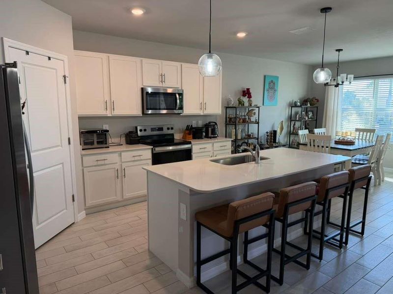 Furnished interior view inside a new home in Burnt Store Village, Punta Gorda (Image 11).