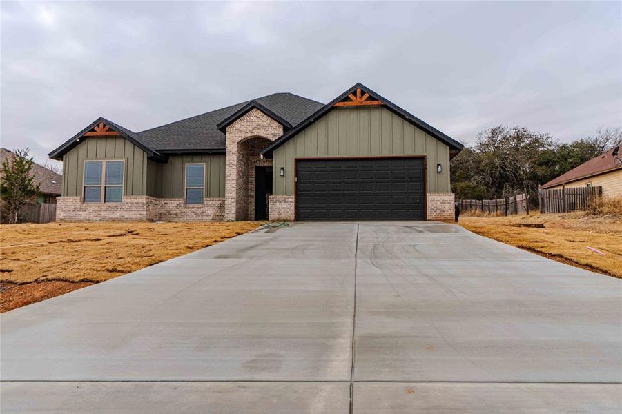 View of front of home featuring a garage