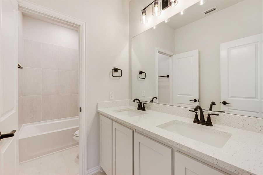 Furnished interior view inside a new home in Hunters Ridge, Crowley (Image 6).
