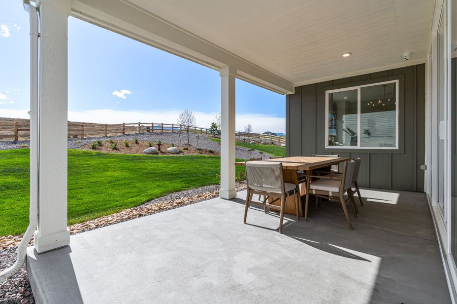 Exterior details and patio area of a home in Sterling Ranch Ascent Village, Littleton (Image 3).