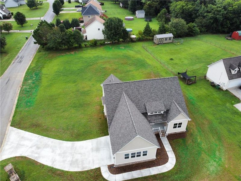 Front exterior of a new home in , Calhoun, GA, highlighting curb appeal (Image 16). Front exterior of a new home in , Calhoun, GA, highlighting curb appeal (Image 16).