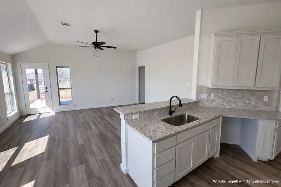 Furnished interior view inside a new home in Pitcock Addition, Graham (Image 3).