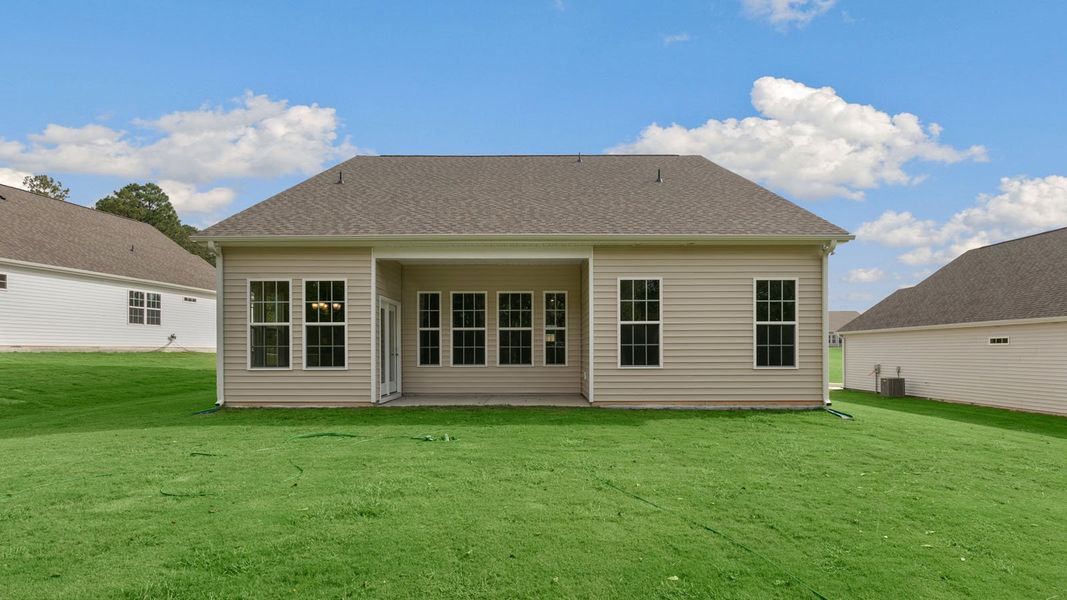 Exterior details and patio area of a home in The Villas at Martin Farms, Aberdeen (Image 20).