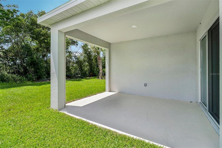 Exterior details and patio area of a home in Trinity Gardens, Deland (Image 2). Exterior details and patio area of a home in Trinity Gardens, Deland (Image 2).