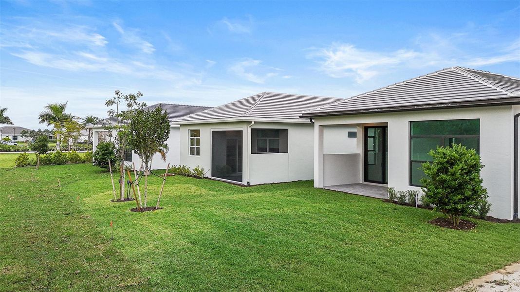 Exterior details and patio area of a home in Cresswind Palm Beach at Westlake, Westlake (Image 4). Exterior details and patio area of a home in Cresswind Palm Beach at Westlake, Westlake (Image 4).