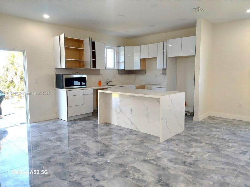 Furnished interior view inside a new home in , Port Charlotte (Image 9).